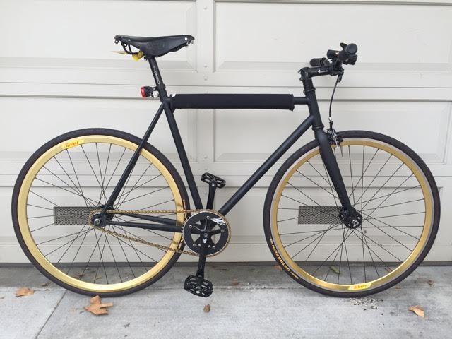Black bicycle, shiny golden metal - Sögreni of Copenhagen